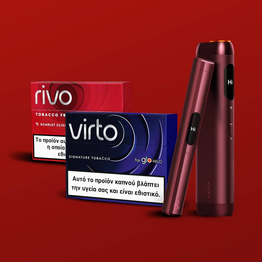 Two sleek electronic vaping devices stand upright next to two packs of tobacco-free sticks, labeled rivo and virto, against a solid red background. Both packs have text in Greek and English.