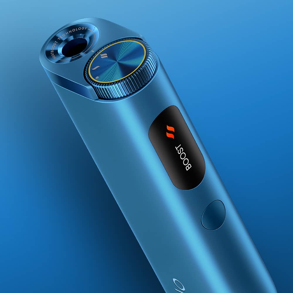 A close-up of a sleek, metallic blue electronic device with a digital display showing the word BOOST and a red symbol, featuring a circular dial and modern design elements on a blue background.
